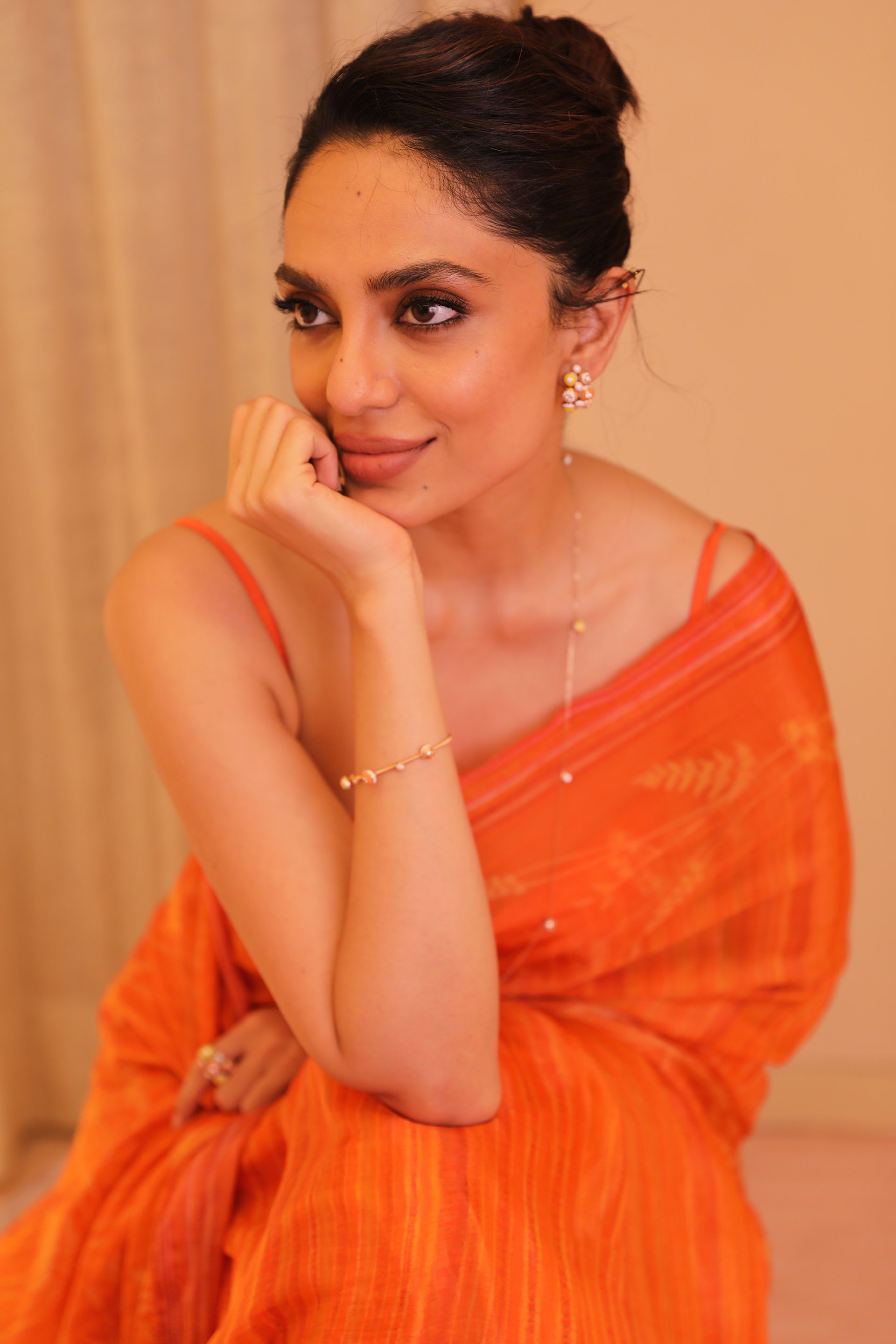 Jewellery on orange saree sale
